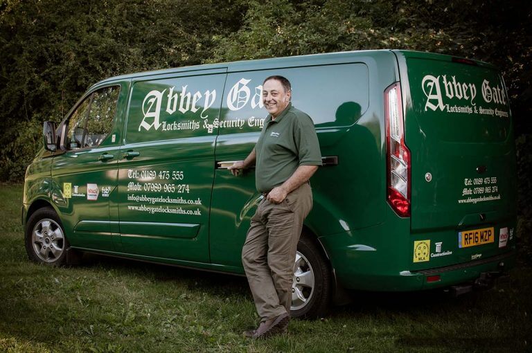 Stephen by his van in woods