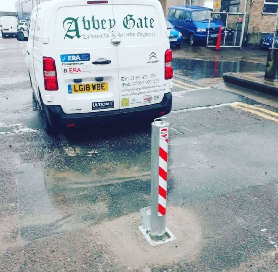 Road bollard next to van